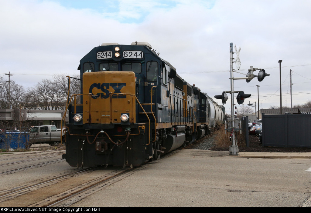 CSX 6244 & 2742 accelerate west with D702